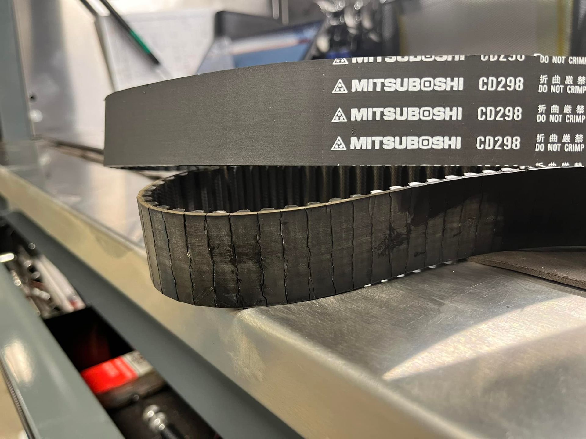A Close Up of a Belt That Says Mitsubishi on It | Golden Valley Automotive