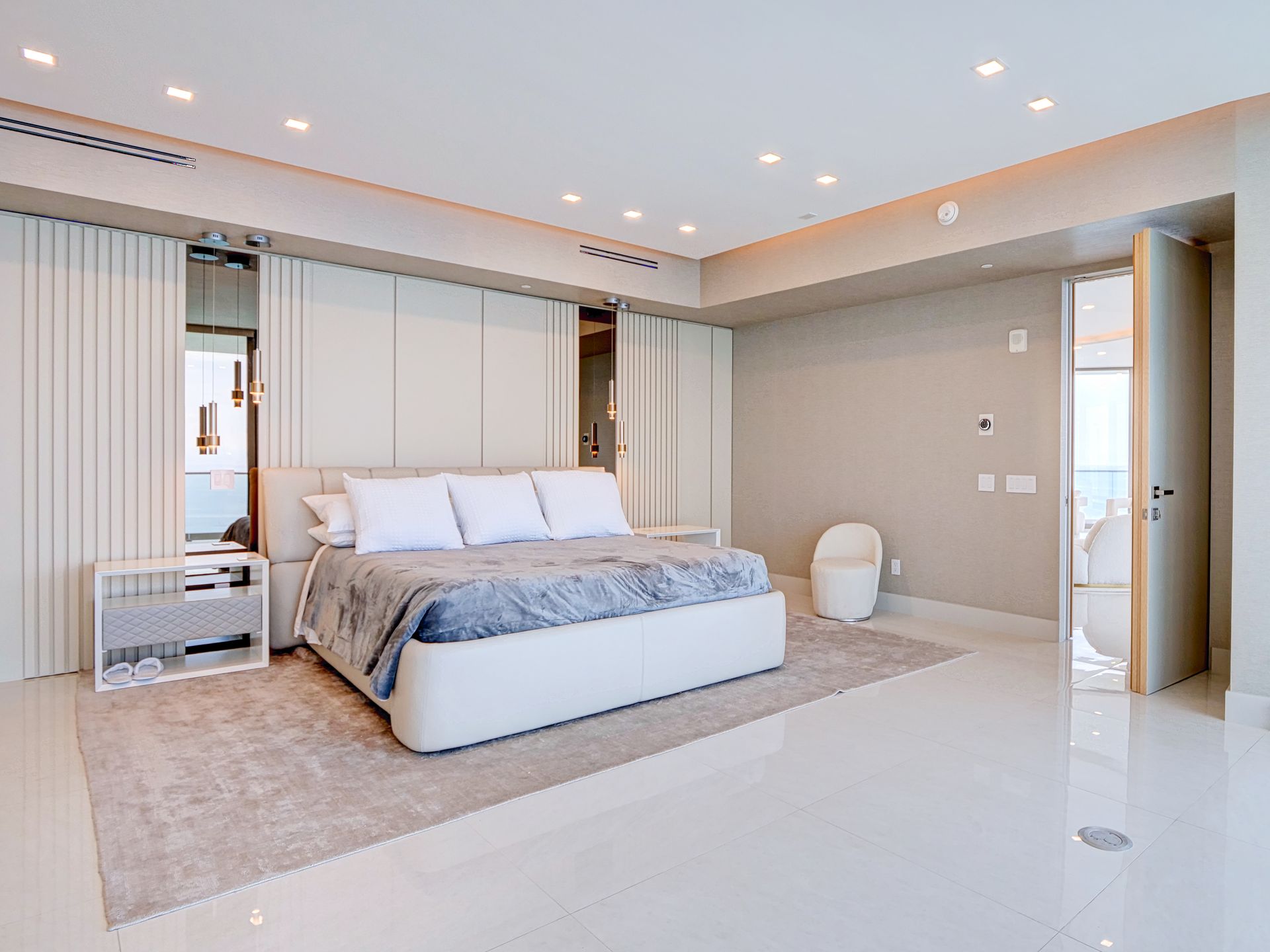 There is a large bed in the middle of the room.