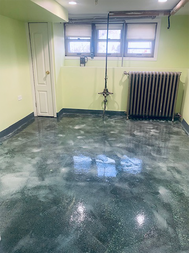 A Room With A Green Flooring — Chicago, IL — Mike's Construction Inc.