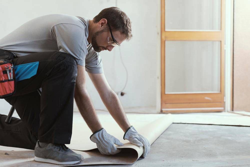 Handyman Renovating Residential Floor — Carpet And Flooring Services in Forster, NSW