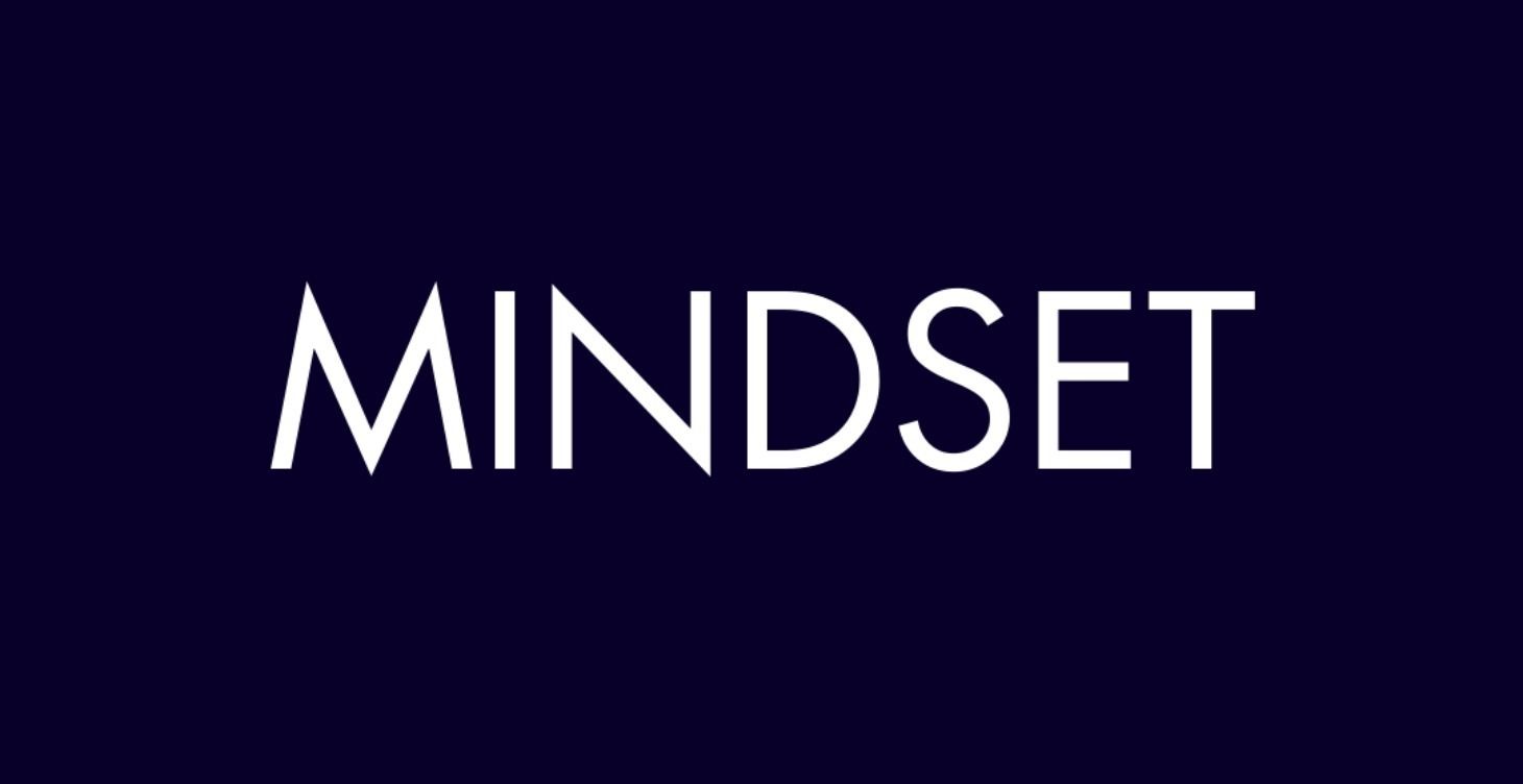 The word mindset is written in white on a dark blue background.