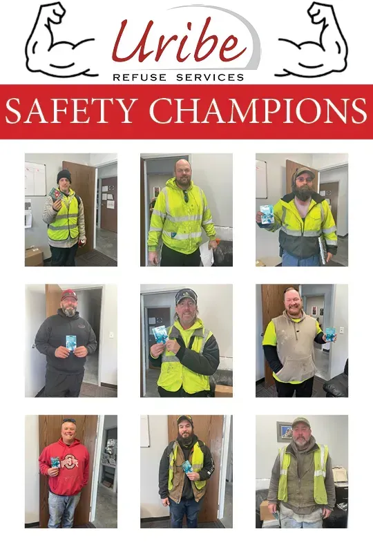 A group of men are standing in front of a sign that says safety champions A group of men are standing in front of a sign that says safety champions