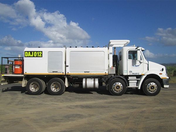 A white truck with dajo12 written on the side