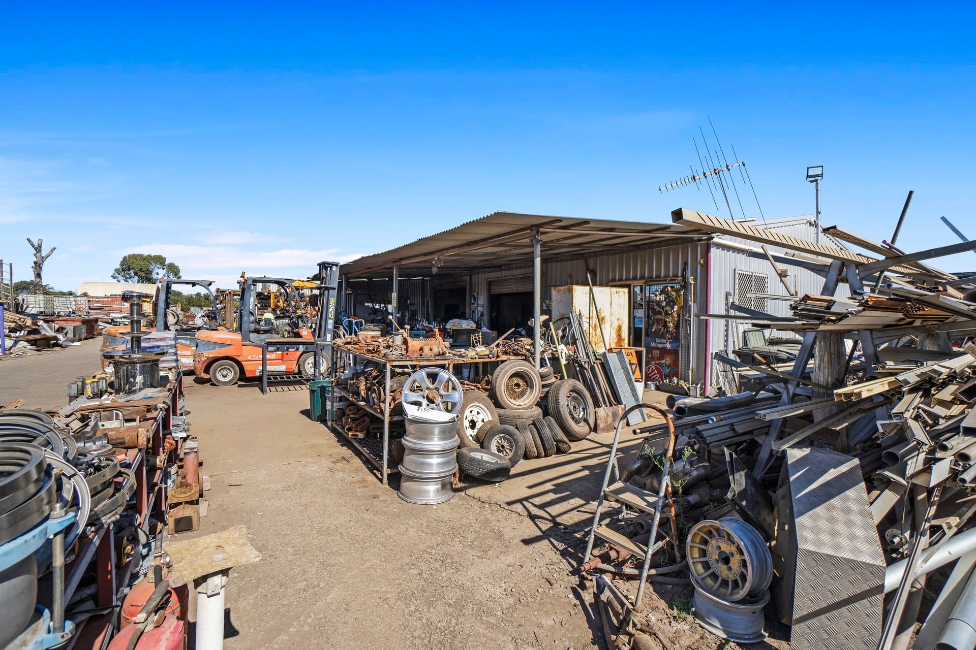 Two Guys Having A Conversation On Site - Recycling Bulk Waste & Scrap Metal in Bundaberg, QLD