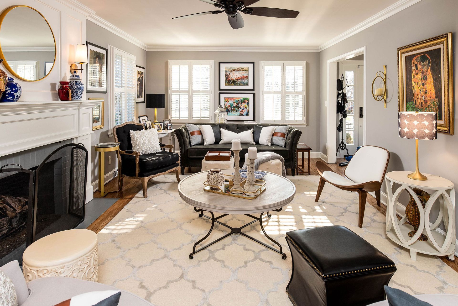 A living room filled with furniture and a fireplace.