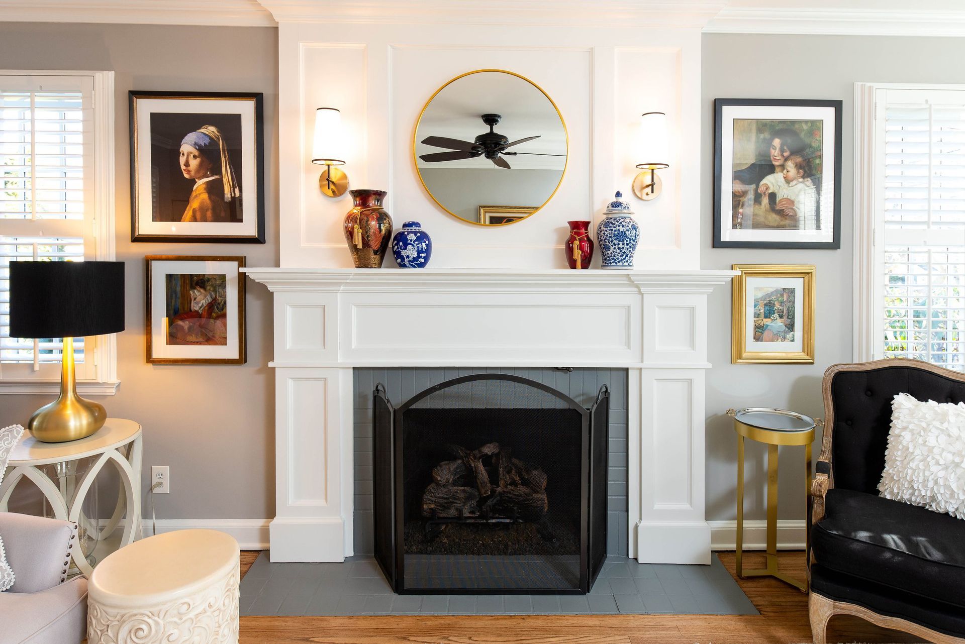 There is a fireplace in the middle of the living room.