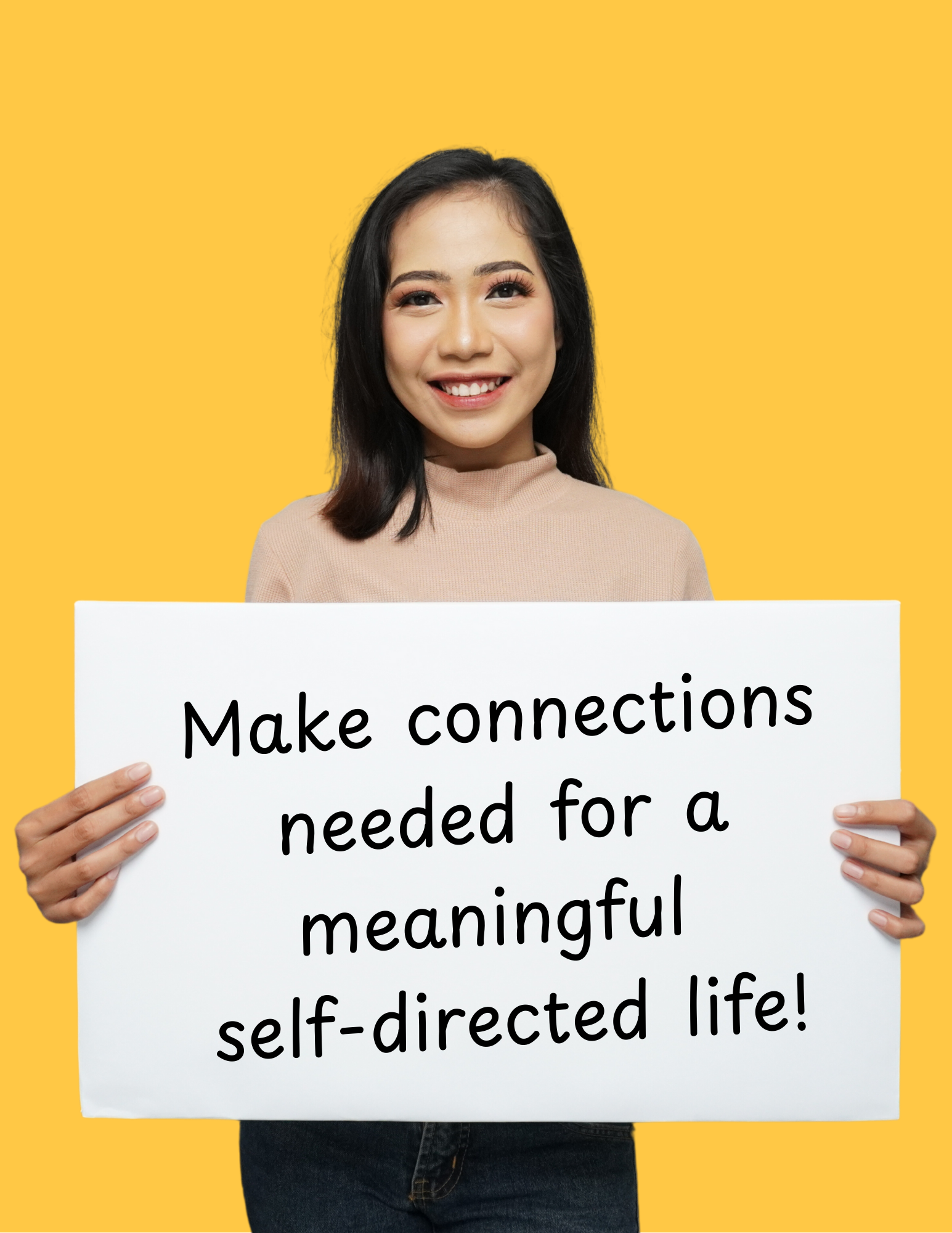 Woman holding a sign which says "Make connections needed for a meaningful self-directed life!