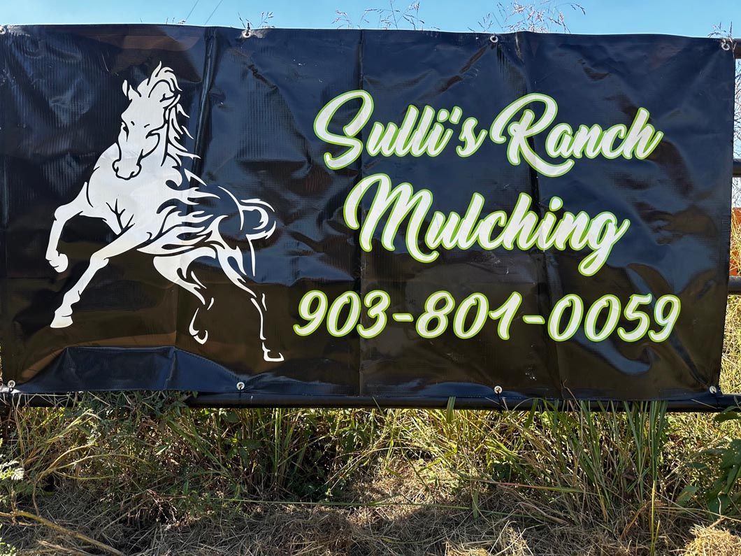 A sign for sulli 's ranch mulching with a horse on it