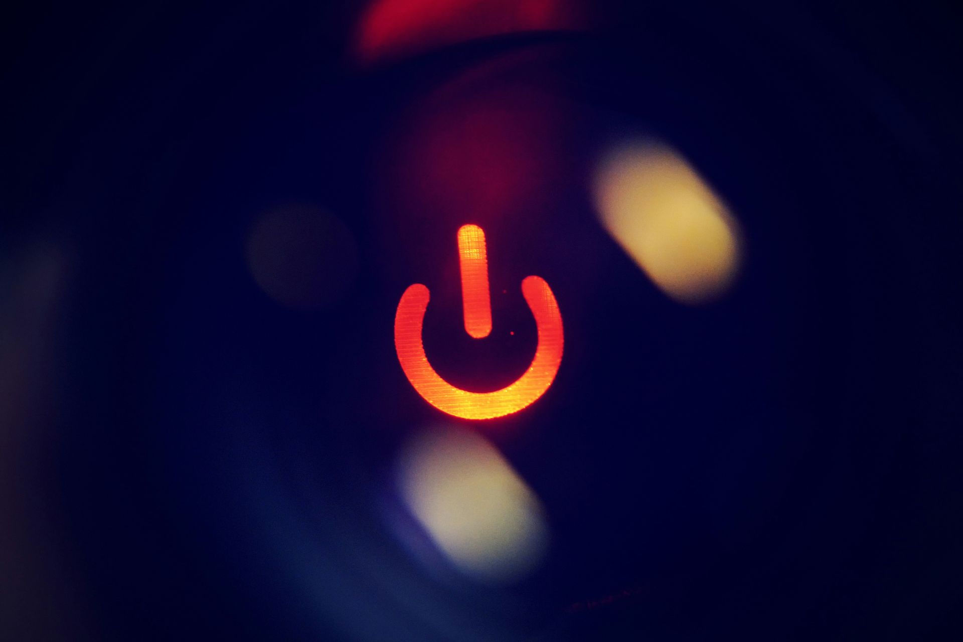 Golden speakers with musical notes on a dark background.