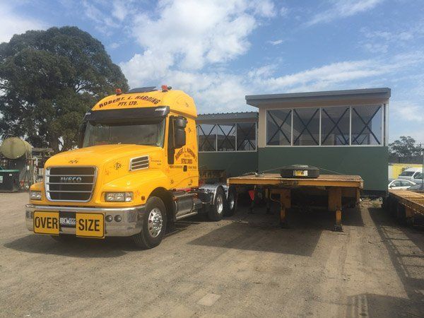 RL Harding truck transporting portable home