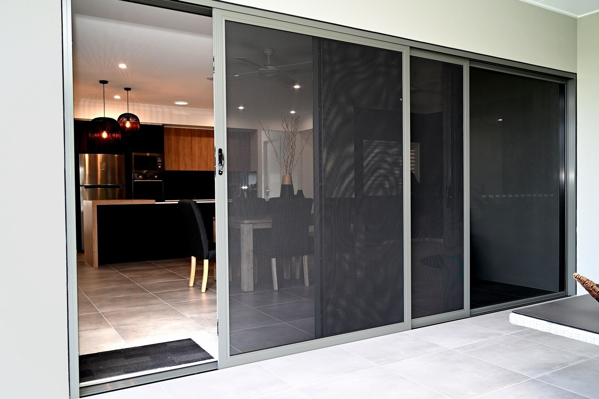 Closing Sliding Fly Screen - Windows & Doors in Townsville, QLD
