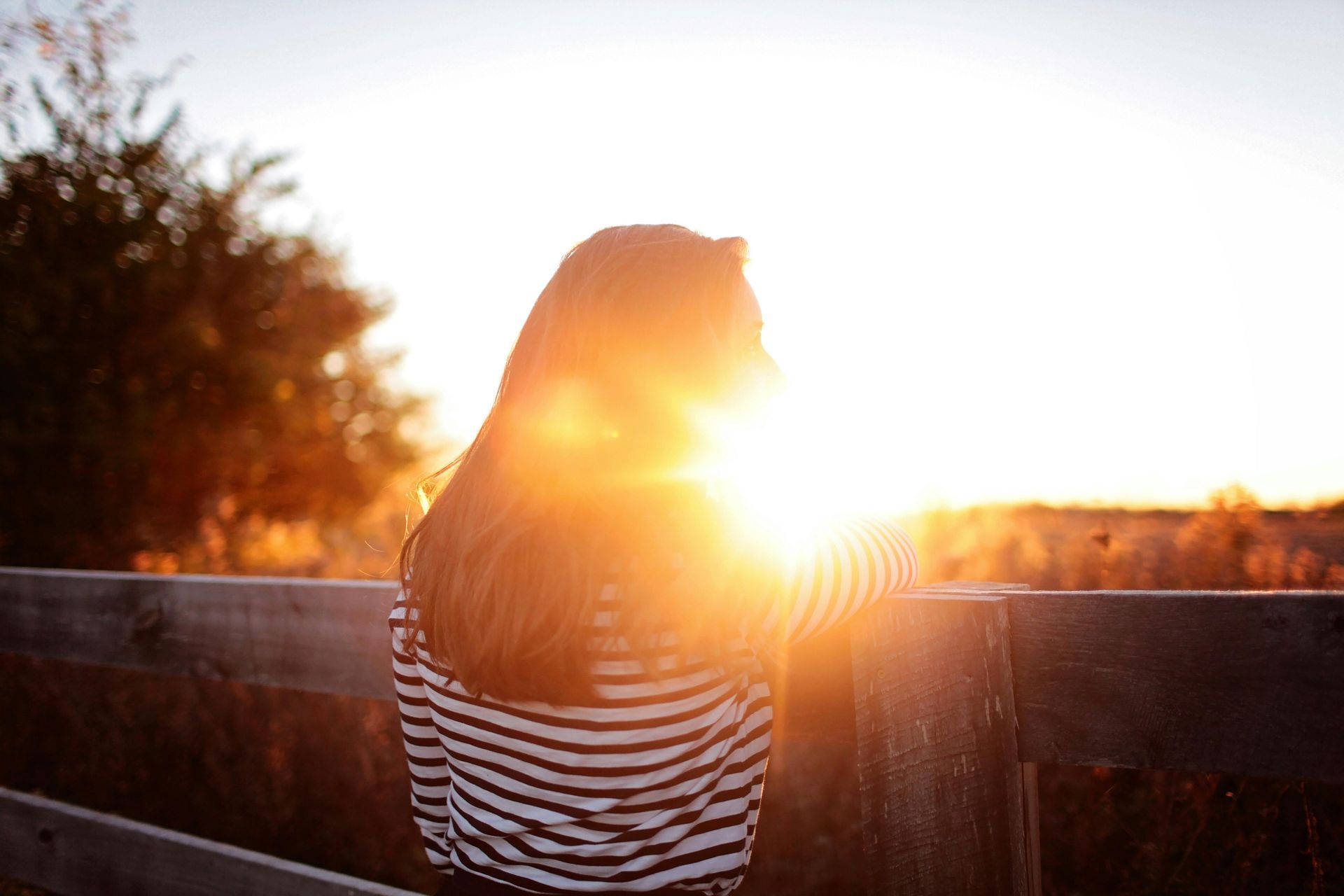 women standing in the setting sun during golden hour holistic healing in ft worth,tx