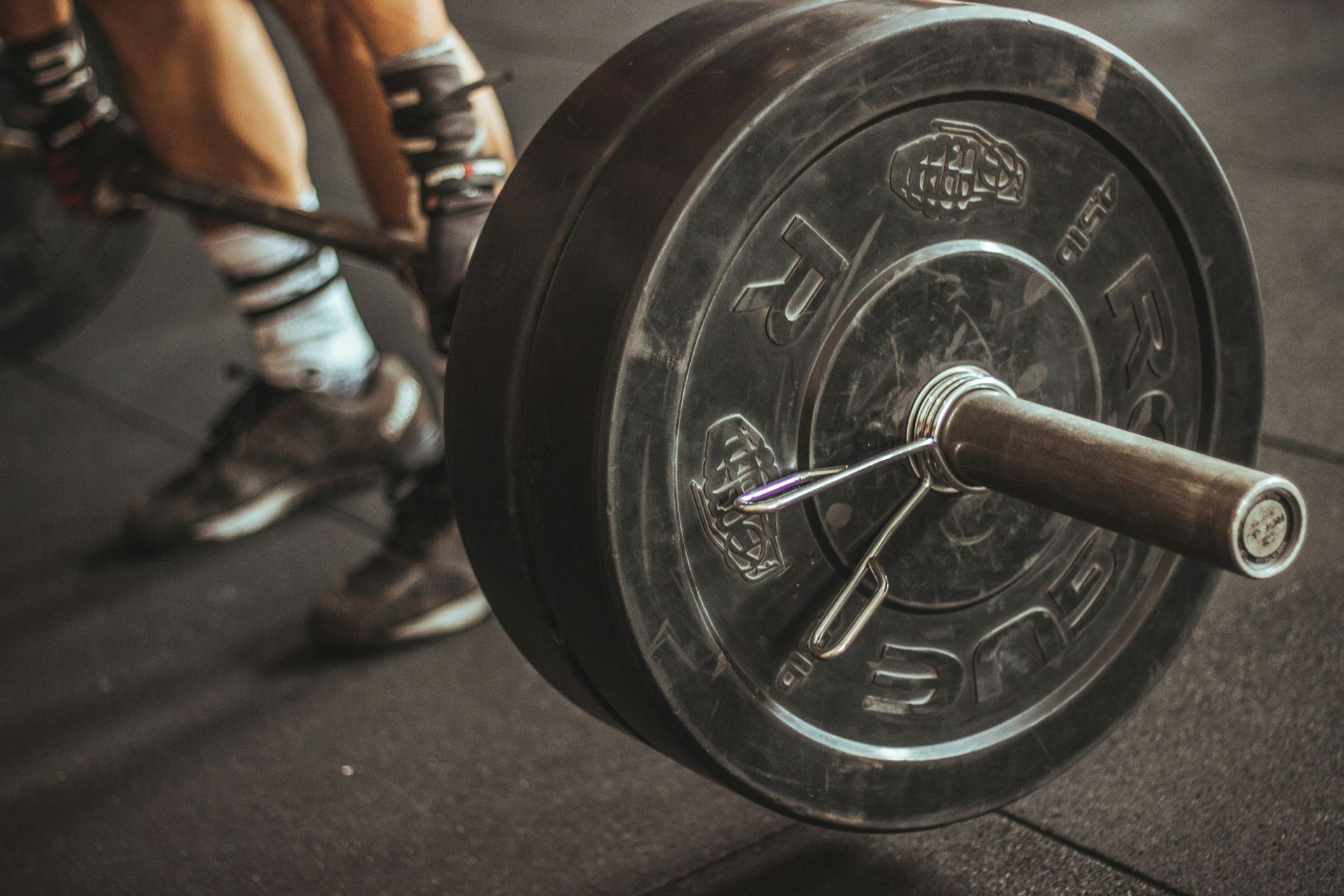 barbell with 45 pound weight plate  executive functional healing fort worth texas
