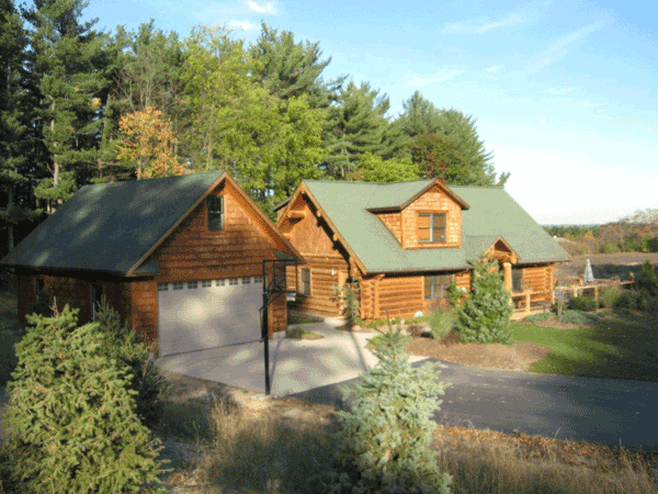 Beautiful Log Cabin House — Kent City, MI — Summit Construction, Inc.— Kent City, MI — Summit Construction, Inc.
