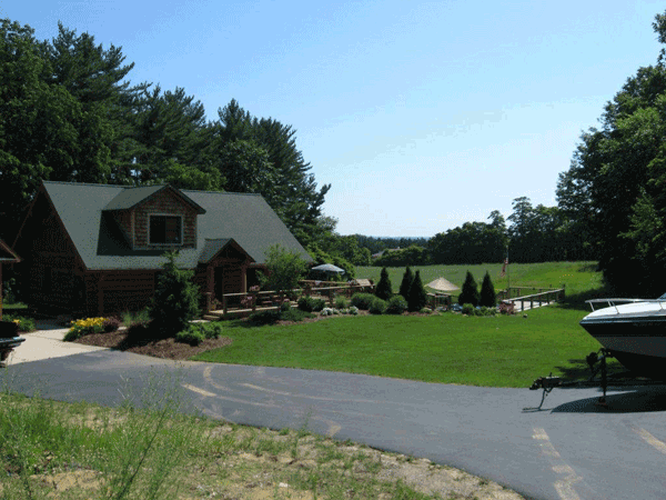 Far View of Log Cabin House — Kent City, MI — Summit Construction, Inc.— Kent City, MI — Summit Construction, Inc.