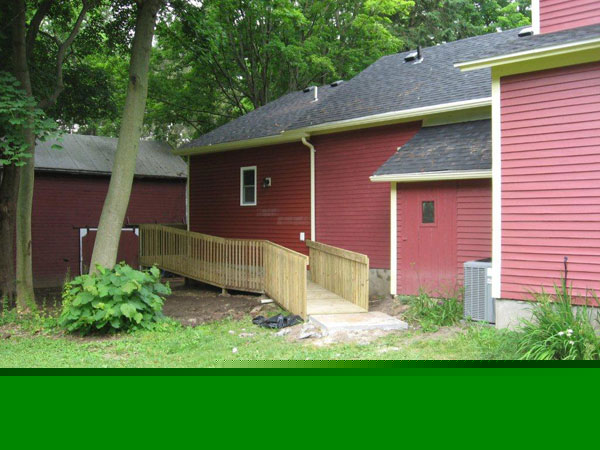 House with Wooden Bridge — Kent City, MI — Summit Construction, Inc.— Kent City, MI — Summit Construction, Inc.