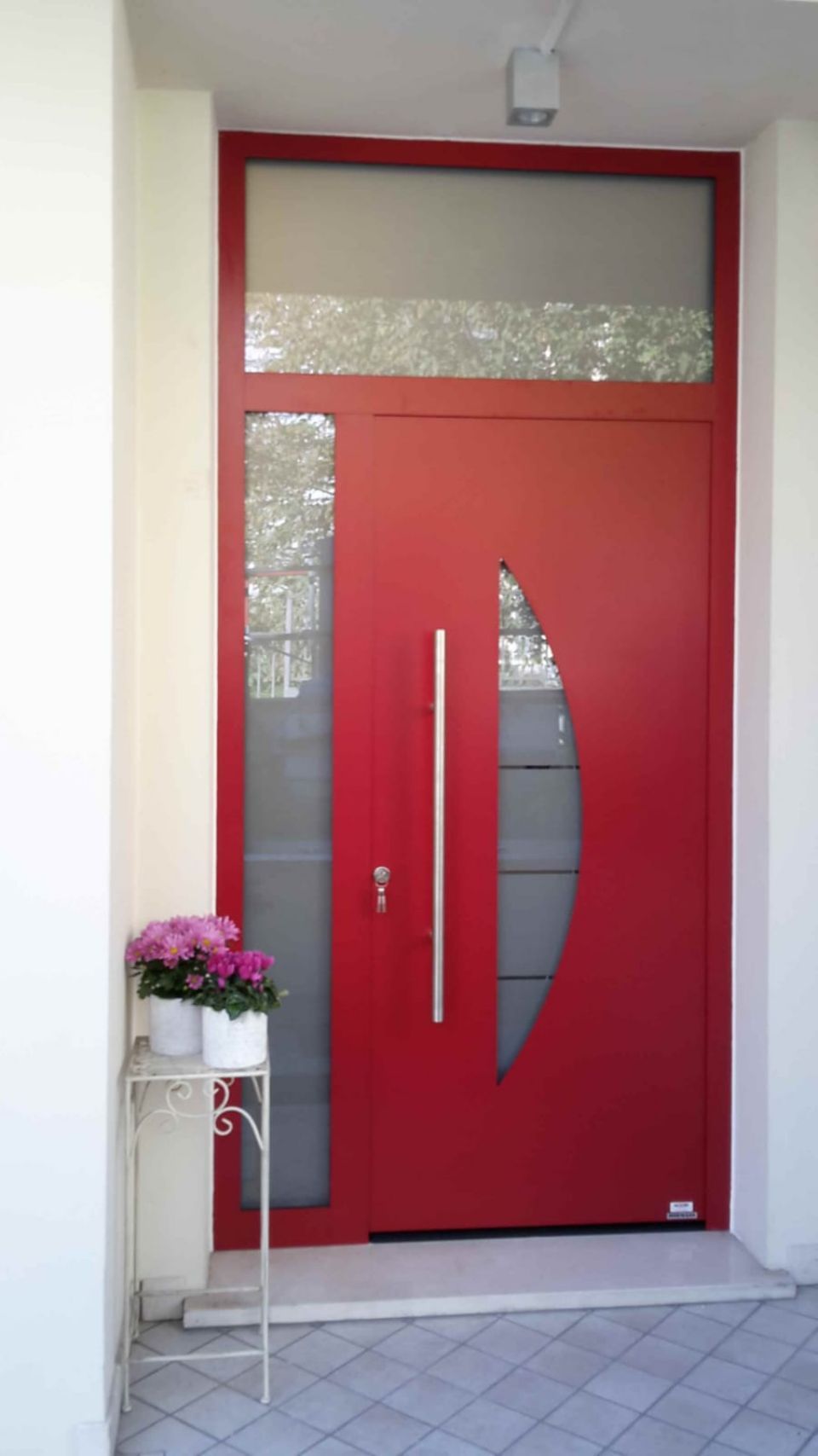 portoncino d'ingresso con sopraluce in vetro