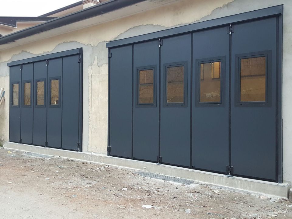 serranda a libro con sezioni in vetro