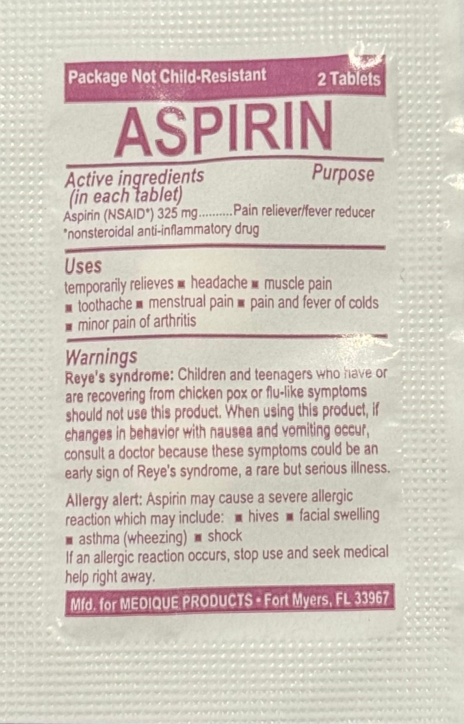 A package of aspirin tablets with a warning label on it