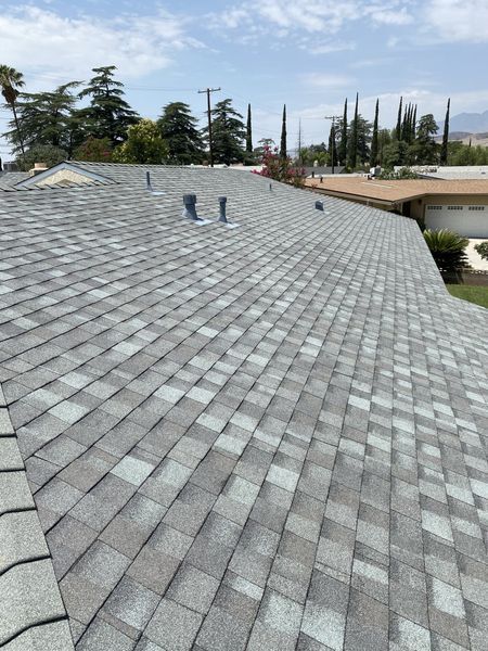 Gray asphalt shingle roof on a house