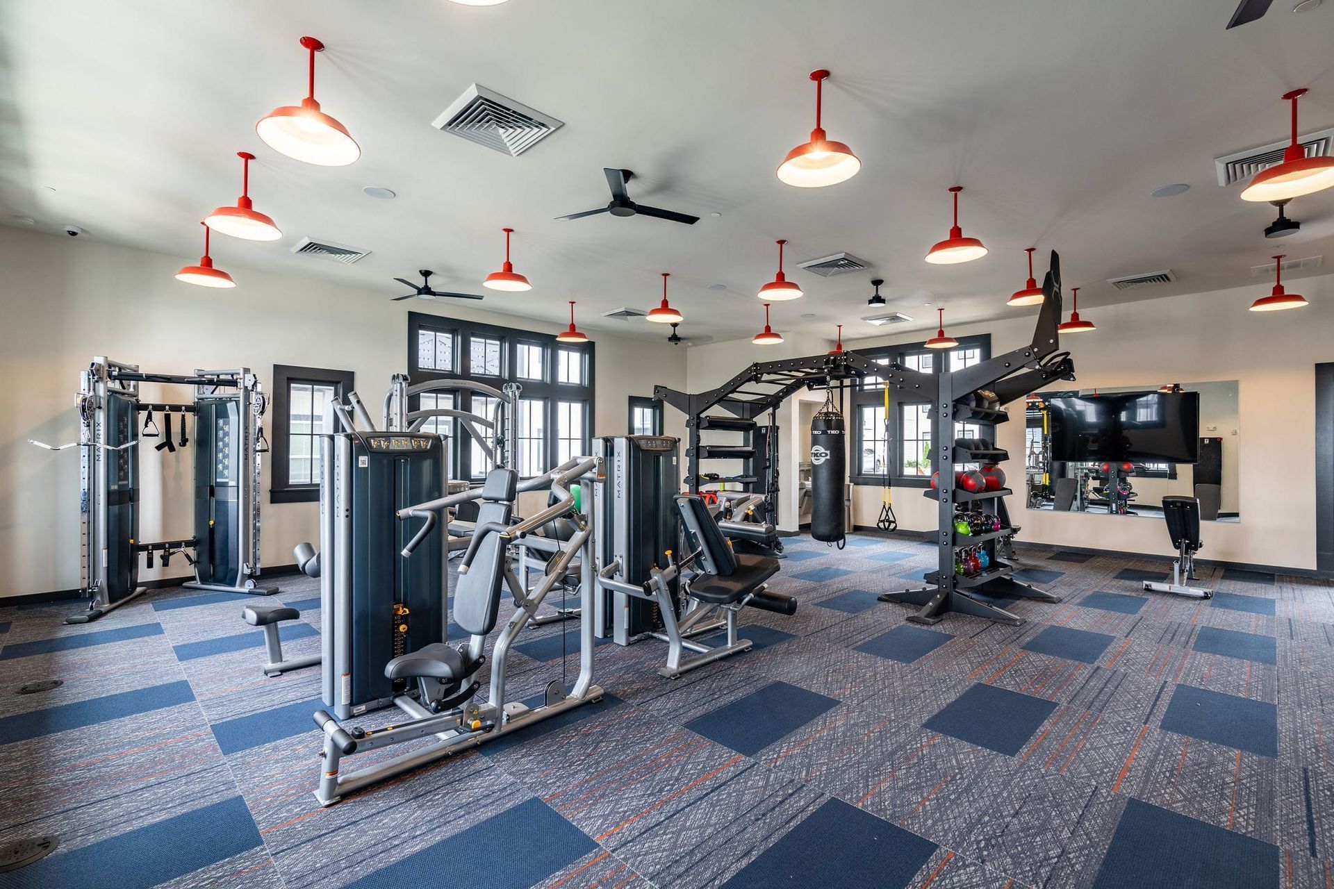 Well-equipped fitness center at Livano Trinity.