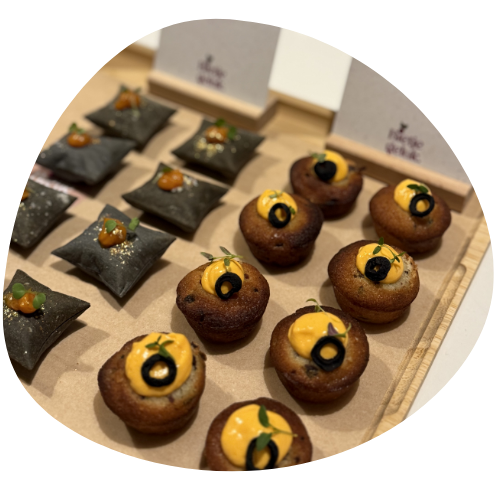 A plate of food with a bowl of dipping sauce on the side.