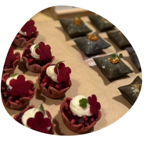 A pizza with broccoli zucchini and onions on it