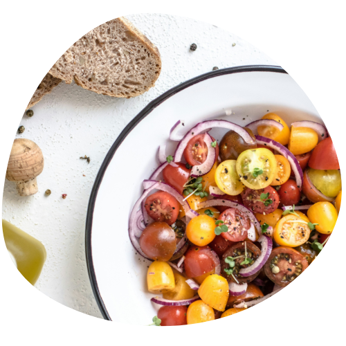 Two wraps with lettuce and carrots on a wooden plate