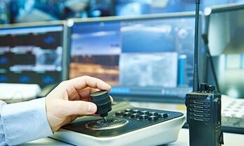 A Person is Holding a Button on a Control Panel — Electronic Security in Tweed, NSW