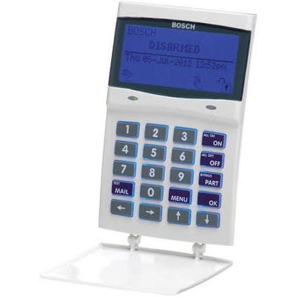 A Bosch Remote Control with a Blue Screen is Sitting on a Stand — Electronic Security in Tweed, NSW