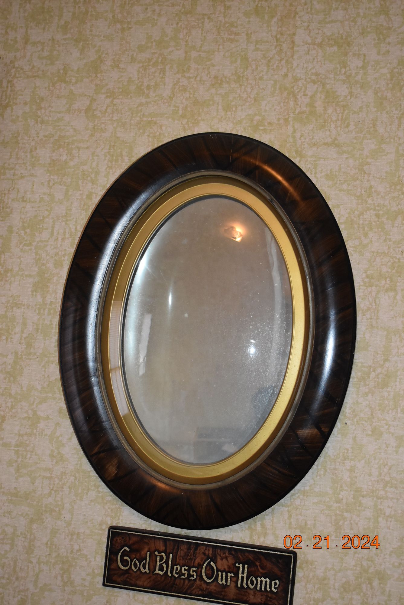 Antique glass mirror.