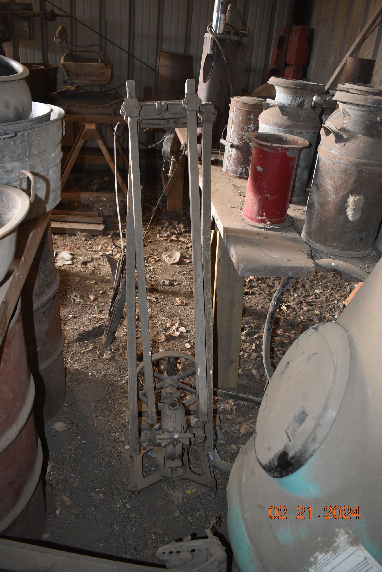 a bunch of barrels are sitting on a table in a room .