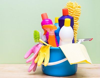 Cleaning Supplies on Wood Table — Jacksonvile, NC — Carolina Clean Care