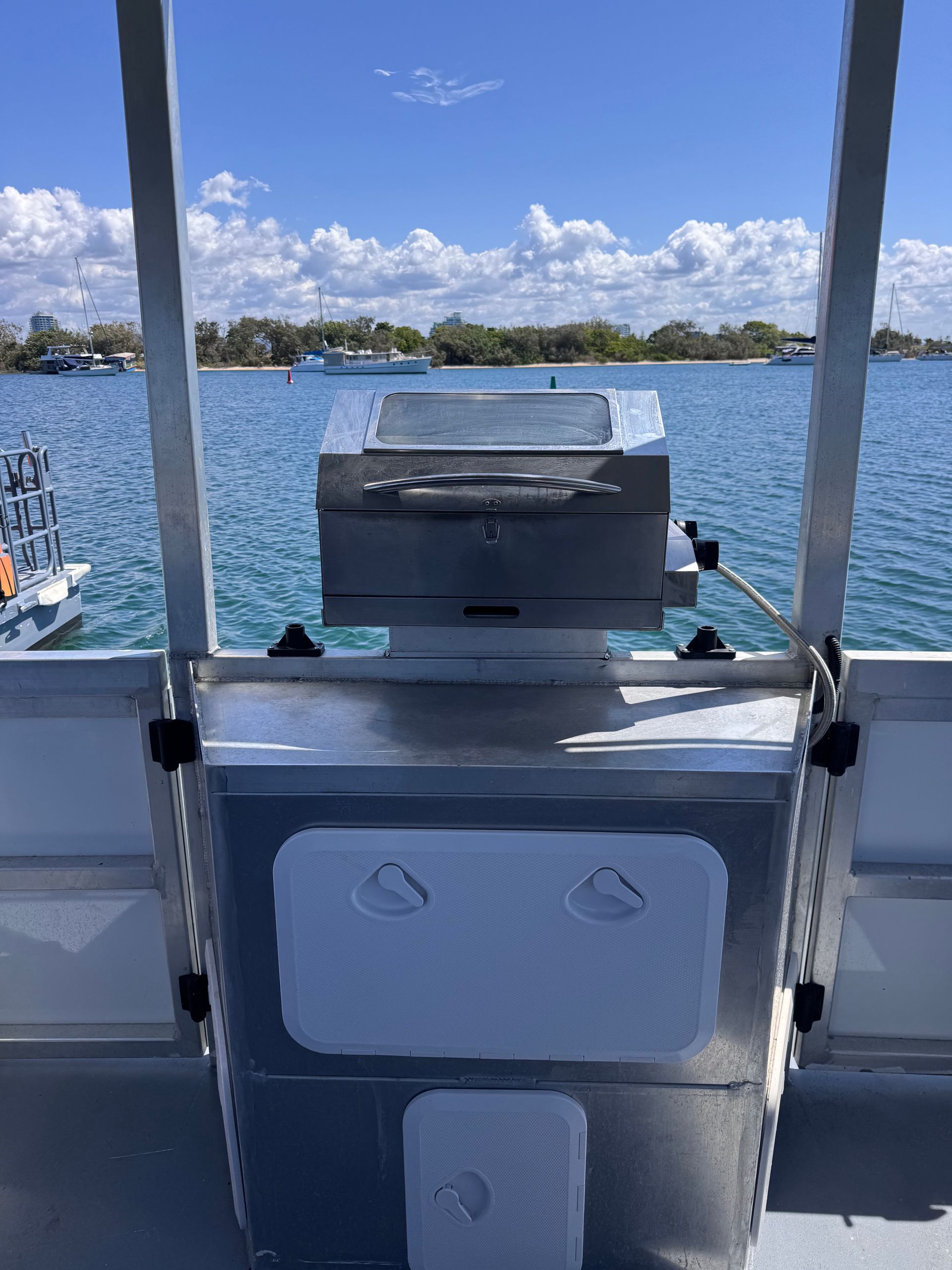 A boat is floating on top of a body of water.