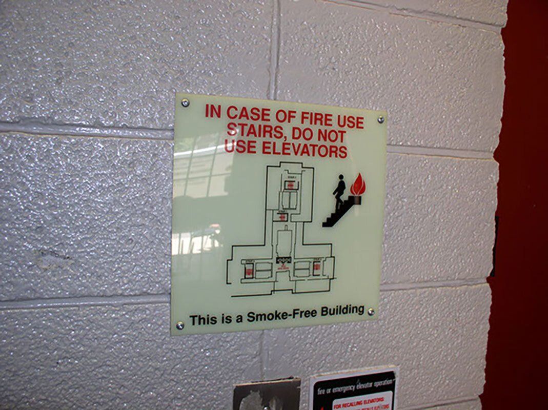 stairs and elevator ada sign