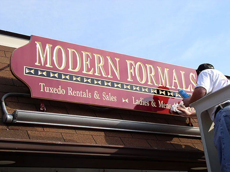 modern formals sandblasted sign