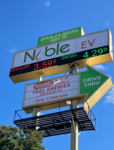 A sign that says noble + ev on it