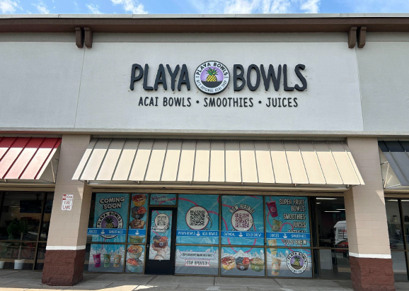 The front of a playa bowls acai bowls smoothies and juices restaurant.