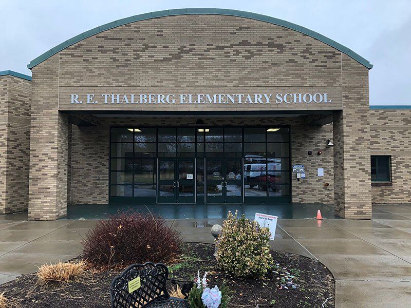 R.E Thalberb school building sign