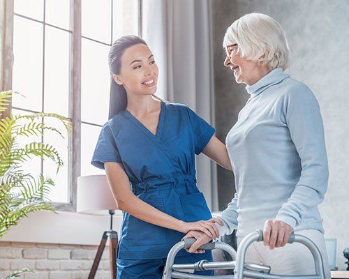 Therapist and Old Woman — Cortland, NY — Fadden & Associates Physical Therapy