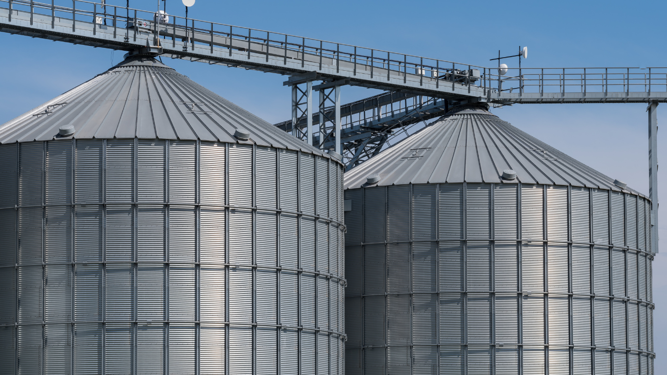 grain bins lined up in a row