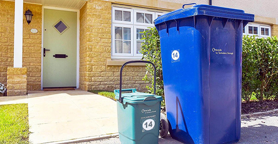 waste bins in front of residence