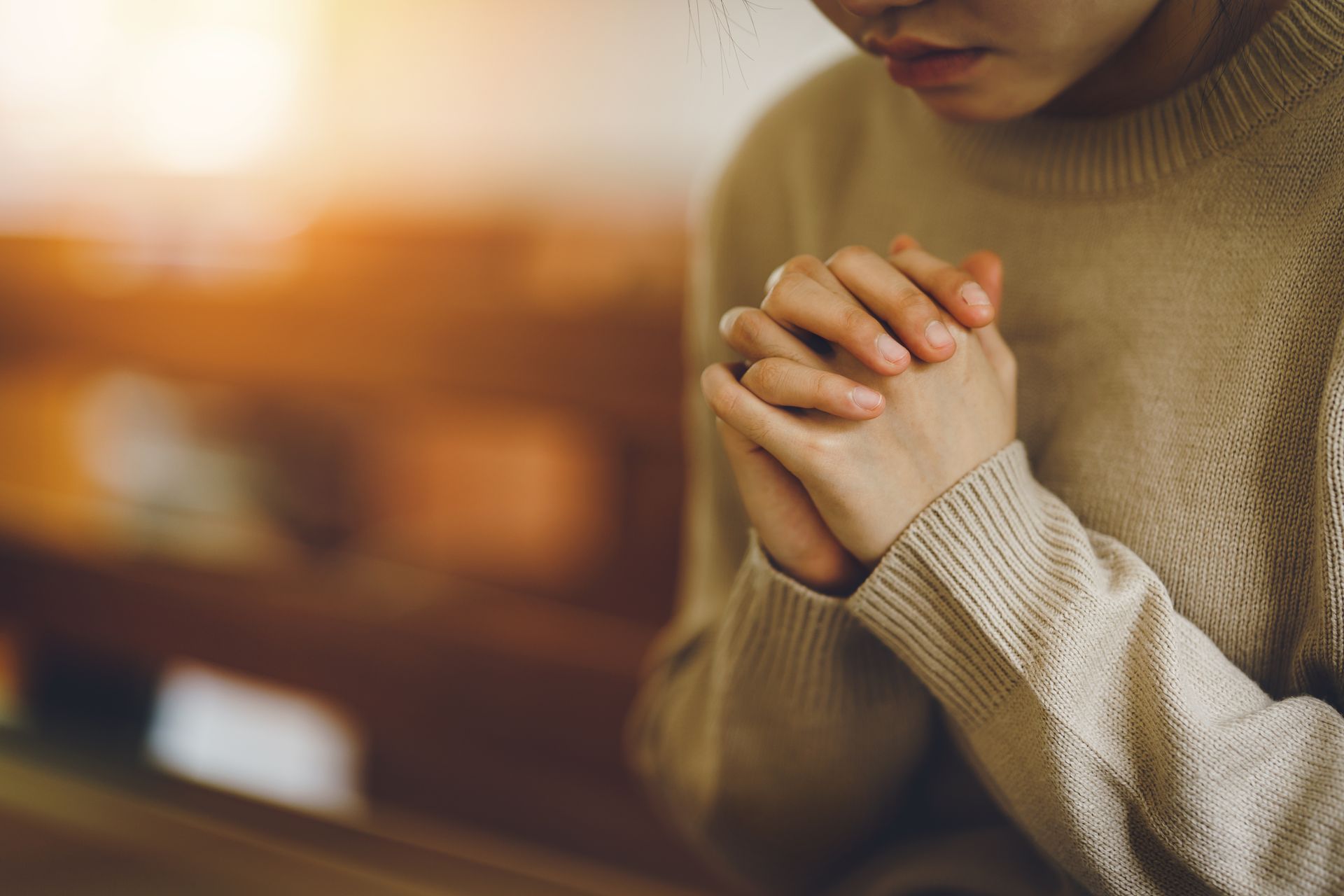 Woman Praying in Church