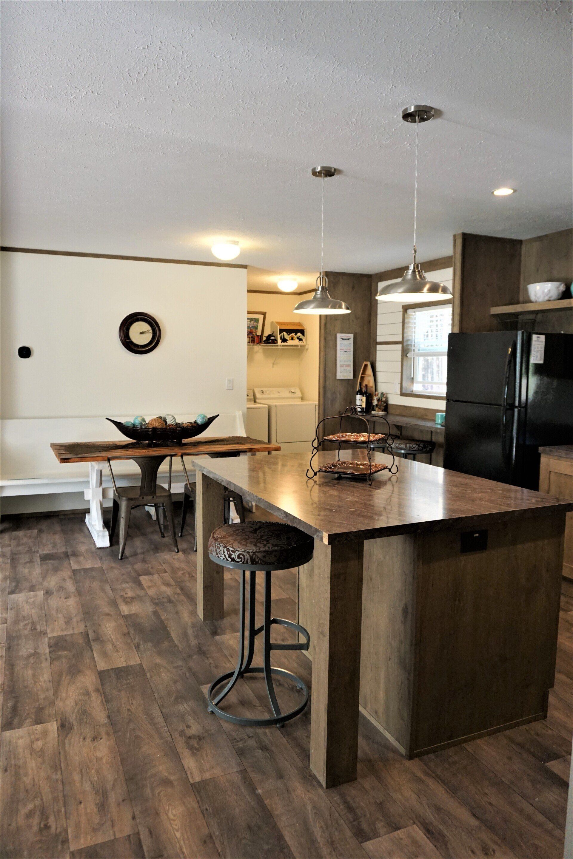 Comfortably accommodates eight people, Private setting, Full kitchen, modern comforts | Barefoot Bay Retreat