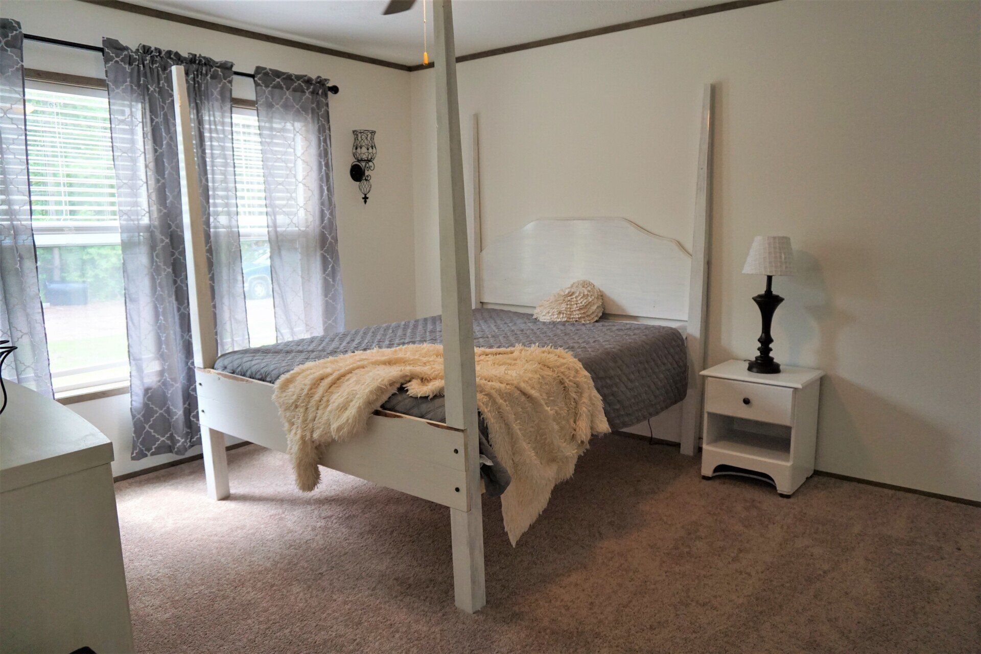 Three bedrooms, Two full bathrooms, Comfortably accommodates eight people | Barefoot Bay Retreat