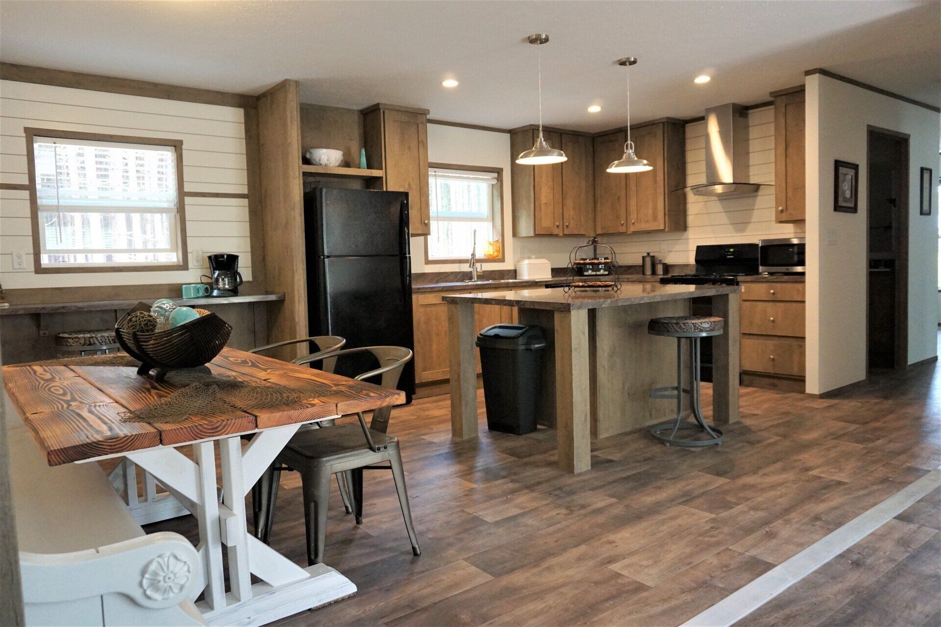 Full kitchen with dishwasher, modern comforts like: WiFi, Central AC, and a Smart TV | Barefoot Bay Retreat