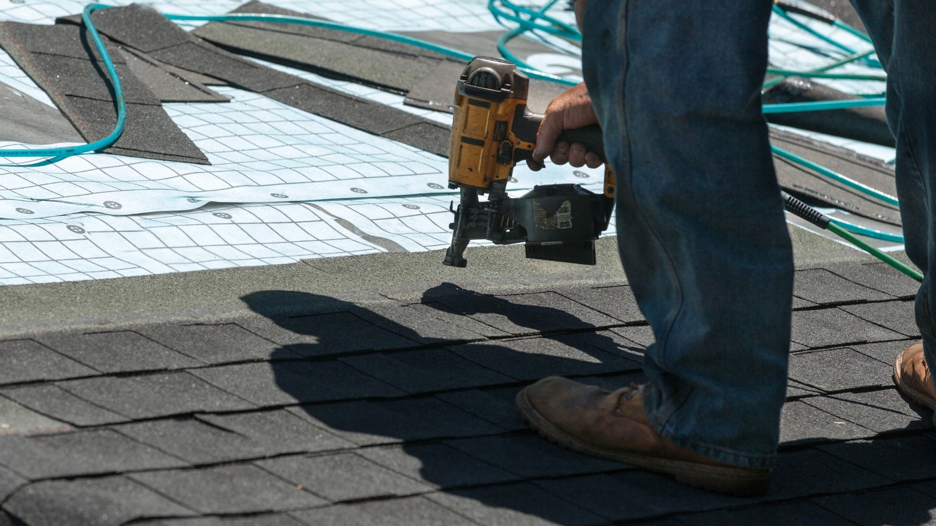 Installing roofing sheets on the roof.