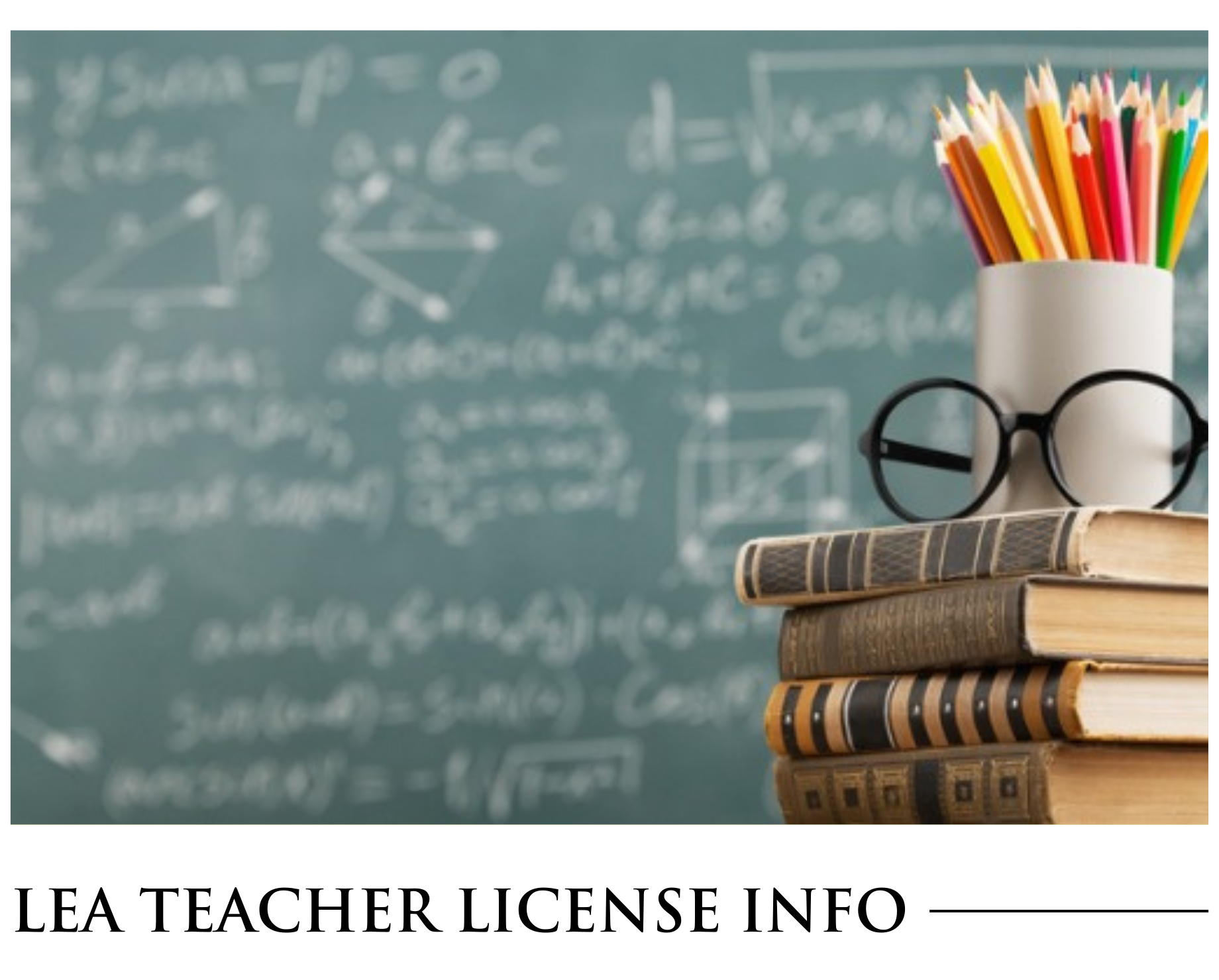 A stack of books with glasses and pencils in front of a blackboard