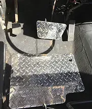 a close up of a pedal on a golf cart .