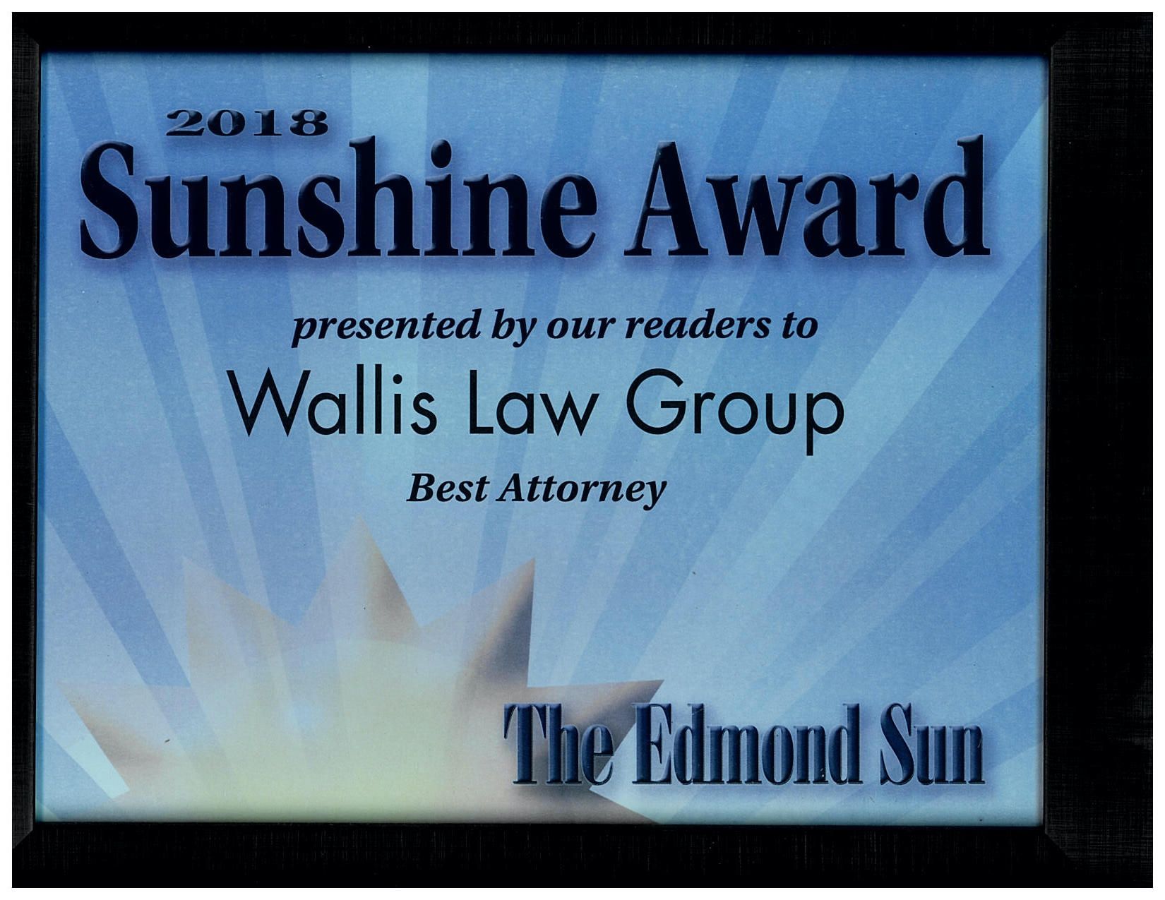 Wallis law group is presented with the sunshine award